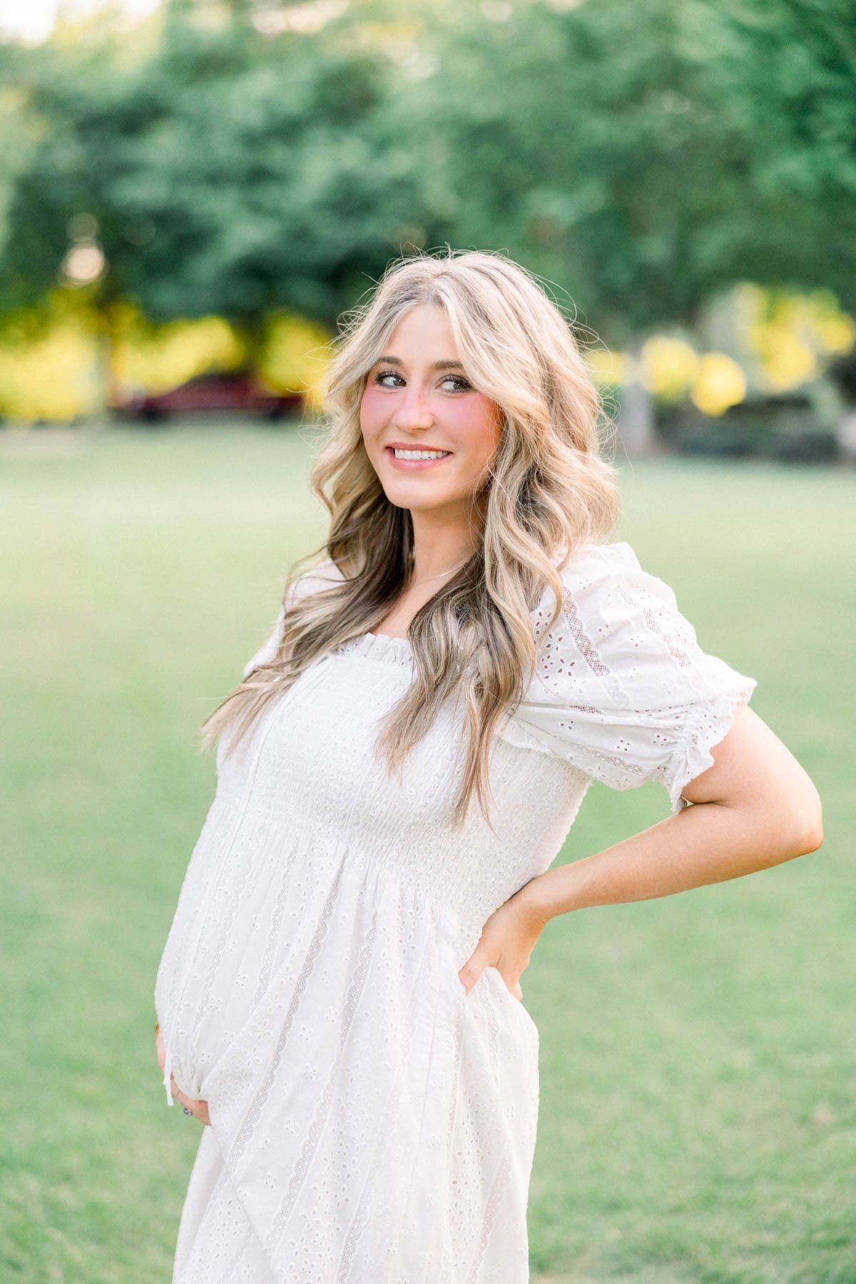 Expecting mother in Hill House dress during Augusta maternity photography session