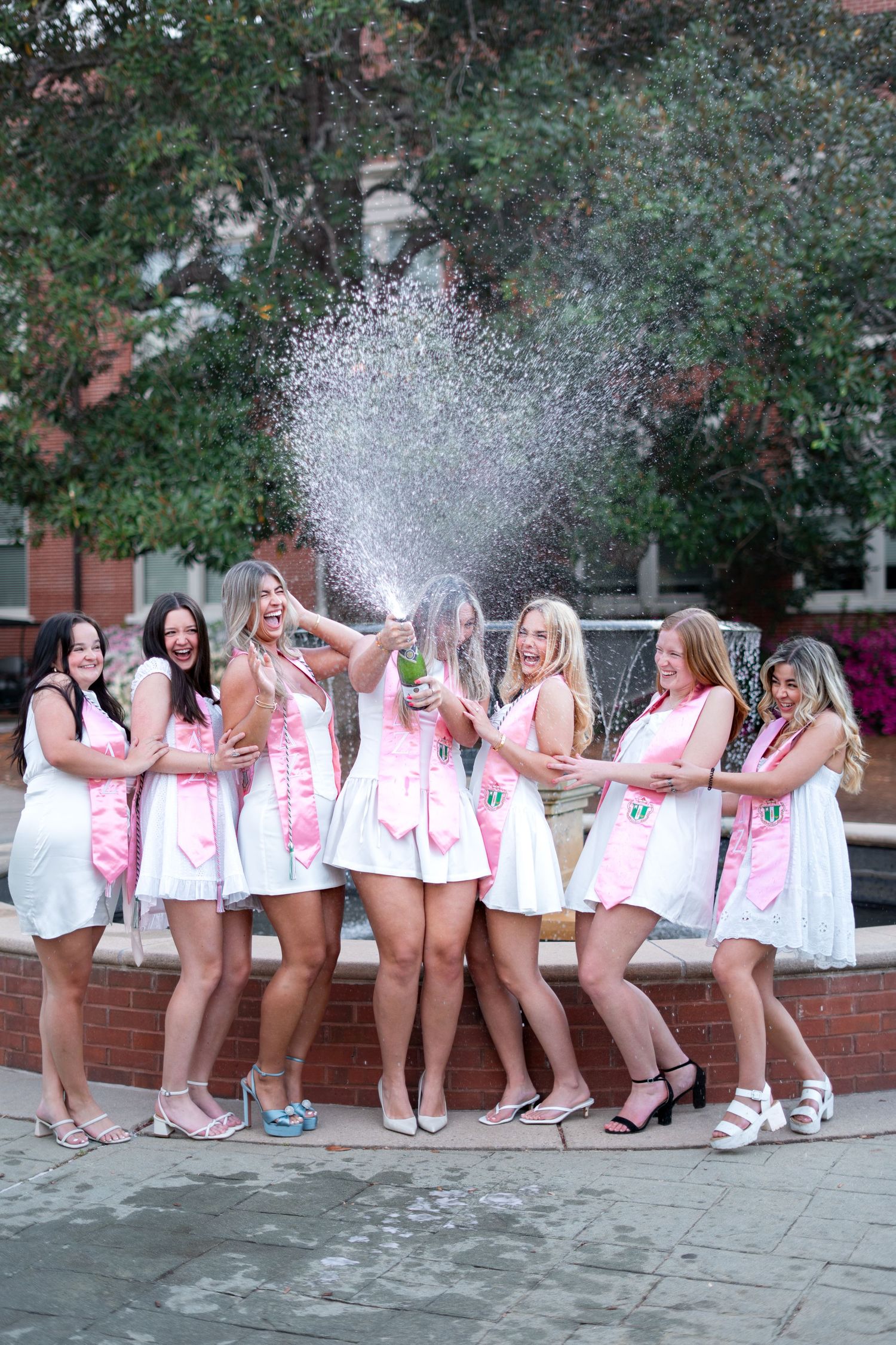 Georgia College graduation photos in front of the gcsu fountain, one of the best spots on the Milledgeville, georgia campus