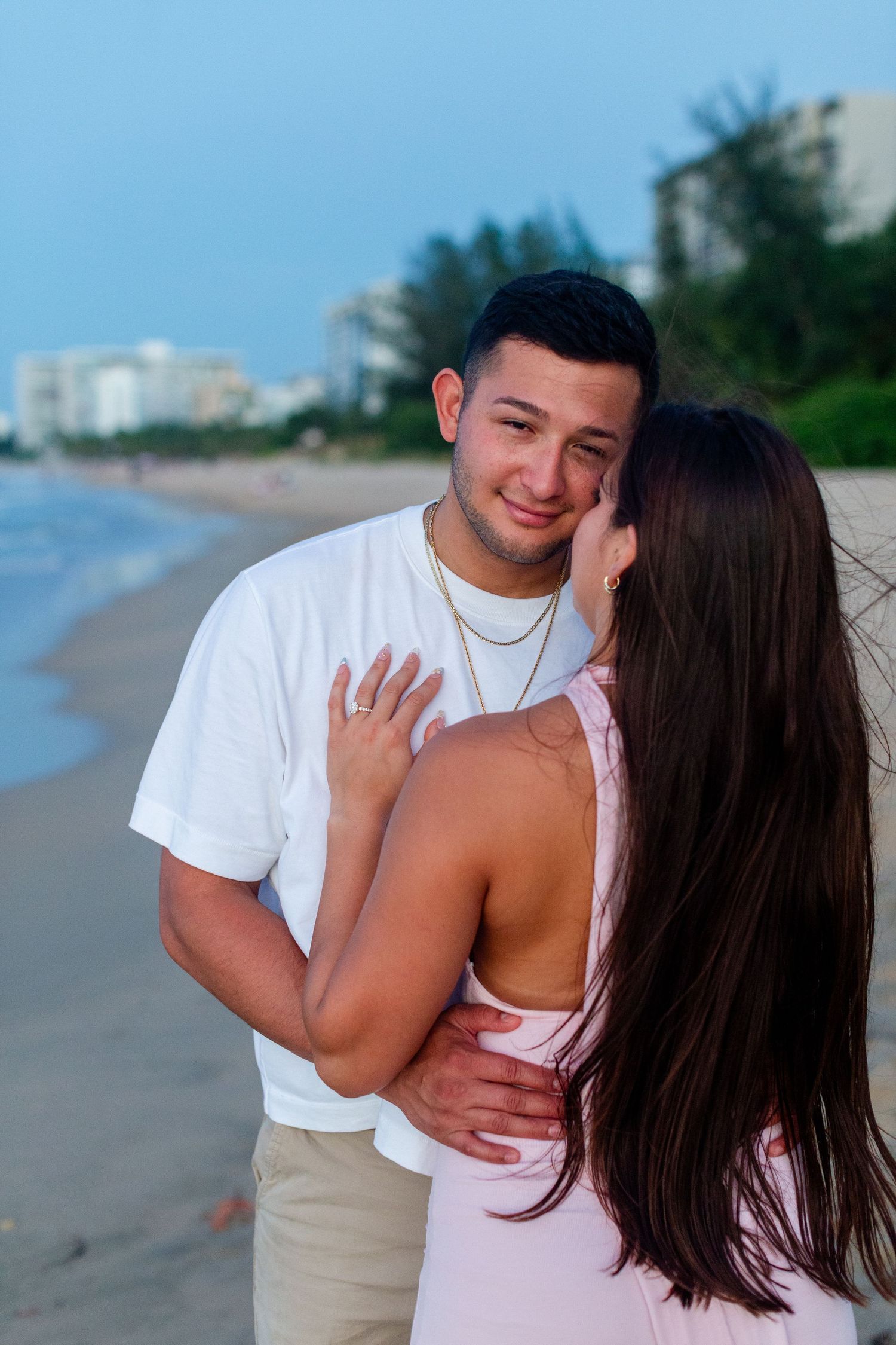 Couples close-up portrait on the beach in Isla Verde, Carolina, Puerto Rico.