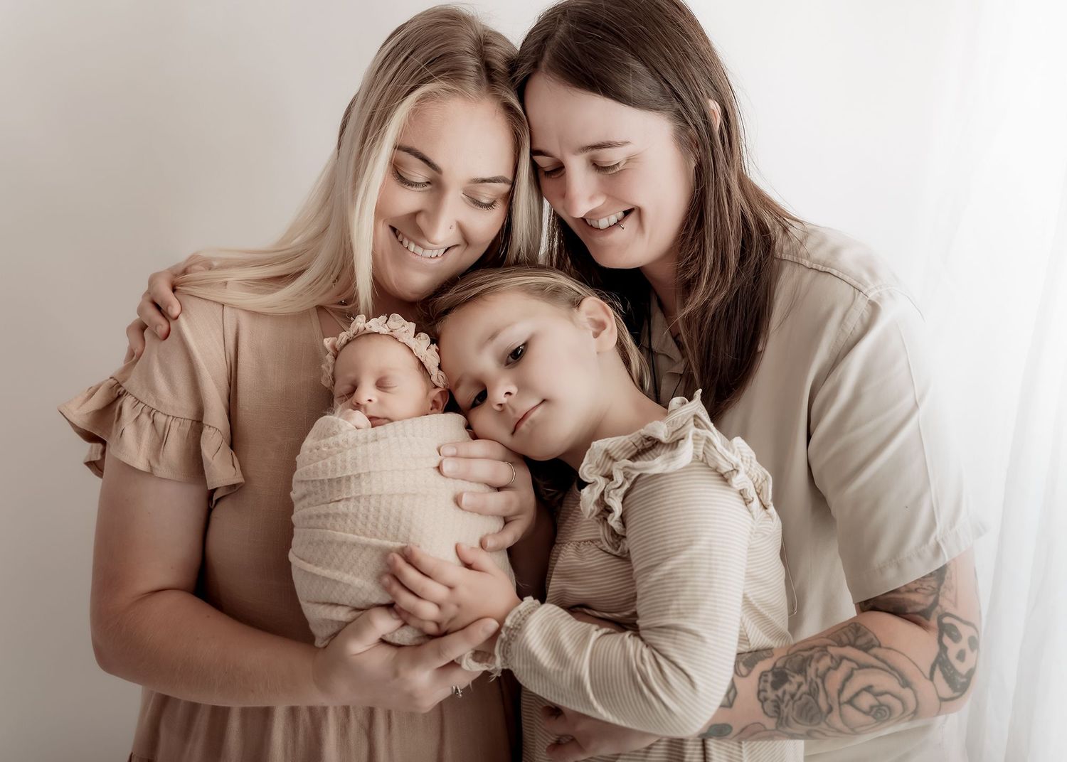 Family portrait with newborn baby in Nelson studio