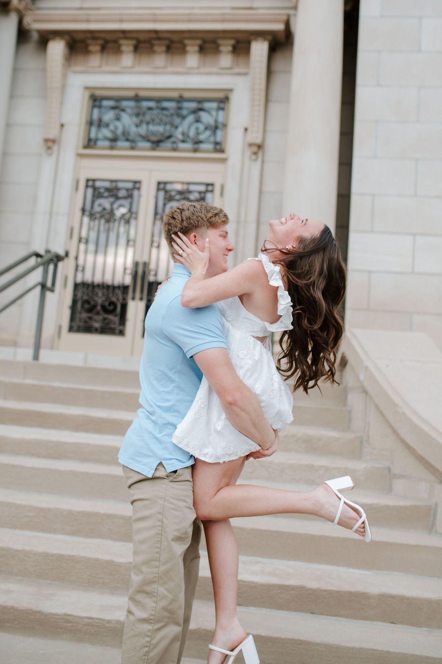 Engagement session in downtown Wichita, KS by photographer Jessica Nadine Photography. Courthouse building, old buildings, fidelity classic