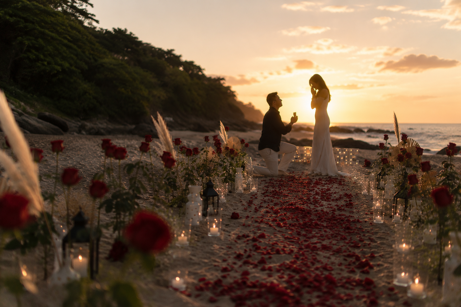 Couple embracing romantically on a sandy beach at sunset with calm ocean waves in the background.