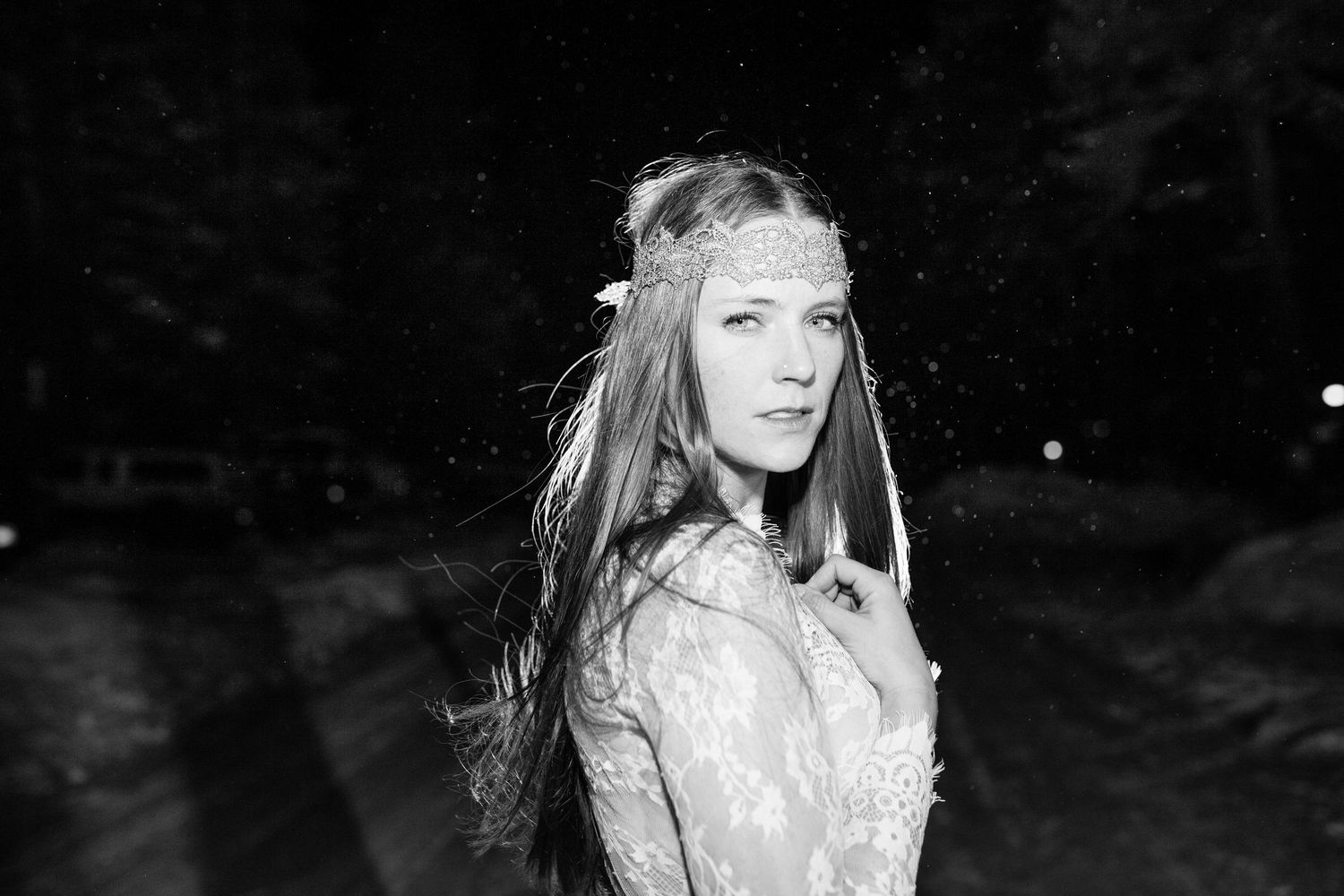 Black and white collage images showing close-up shots of someone in dramatic lighting against dark backgrounds.