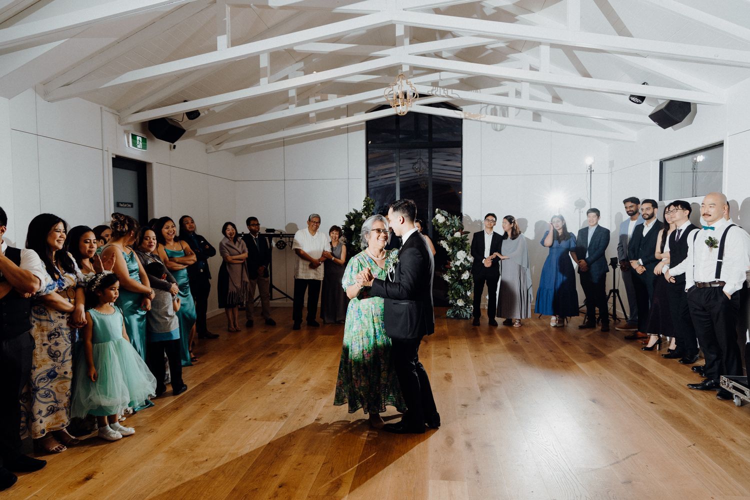 A mom and son moment captured by Apertured Media Auckland Wedding Photographer.