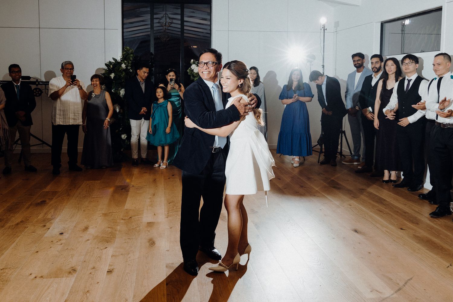 The dad and bride's first dance on her wedding day captured by Apertured Media Auckland Wedding Photographer.