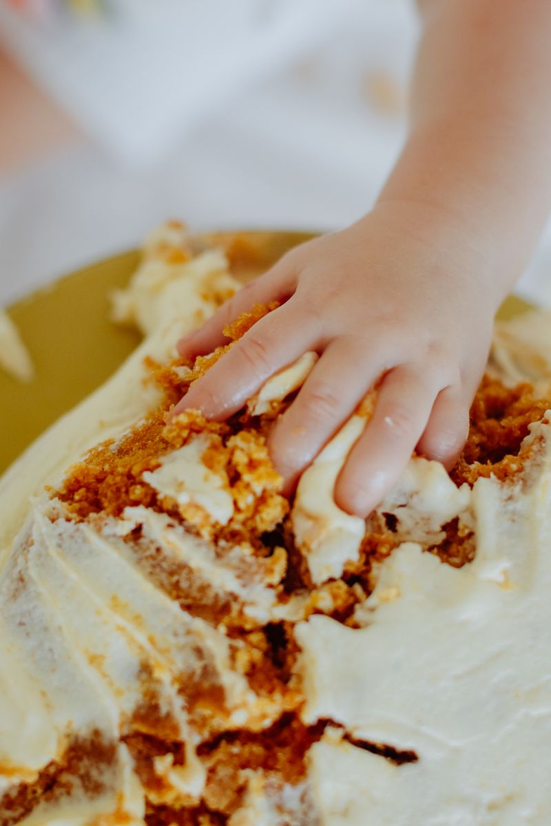 cake being eaten during cake smash mini session
