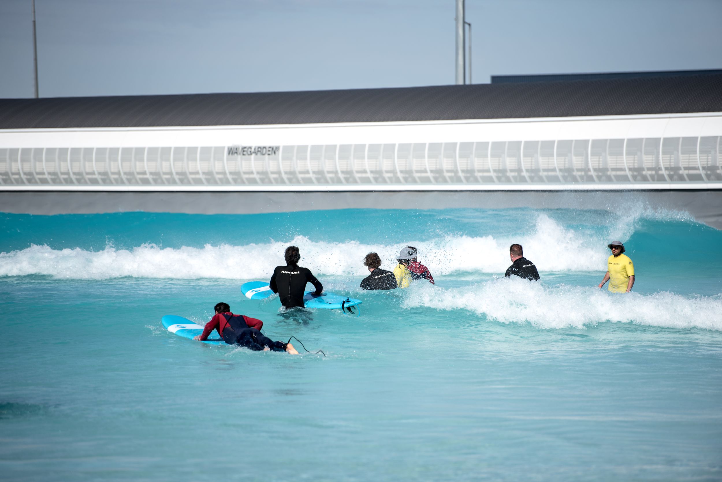 people in the waves at Urbansurf