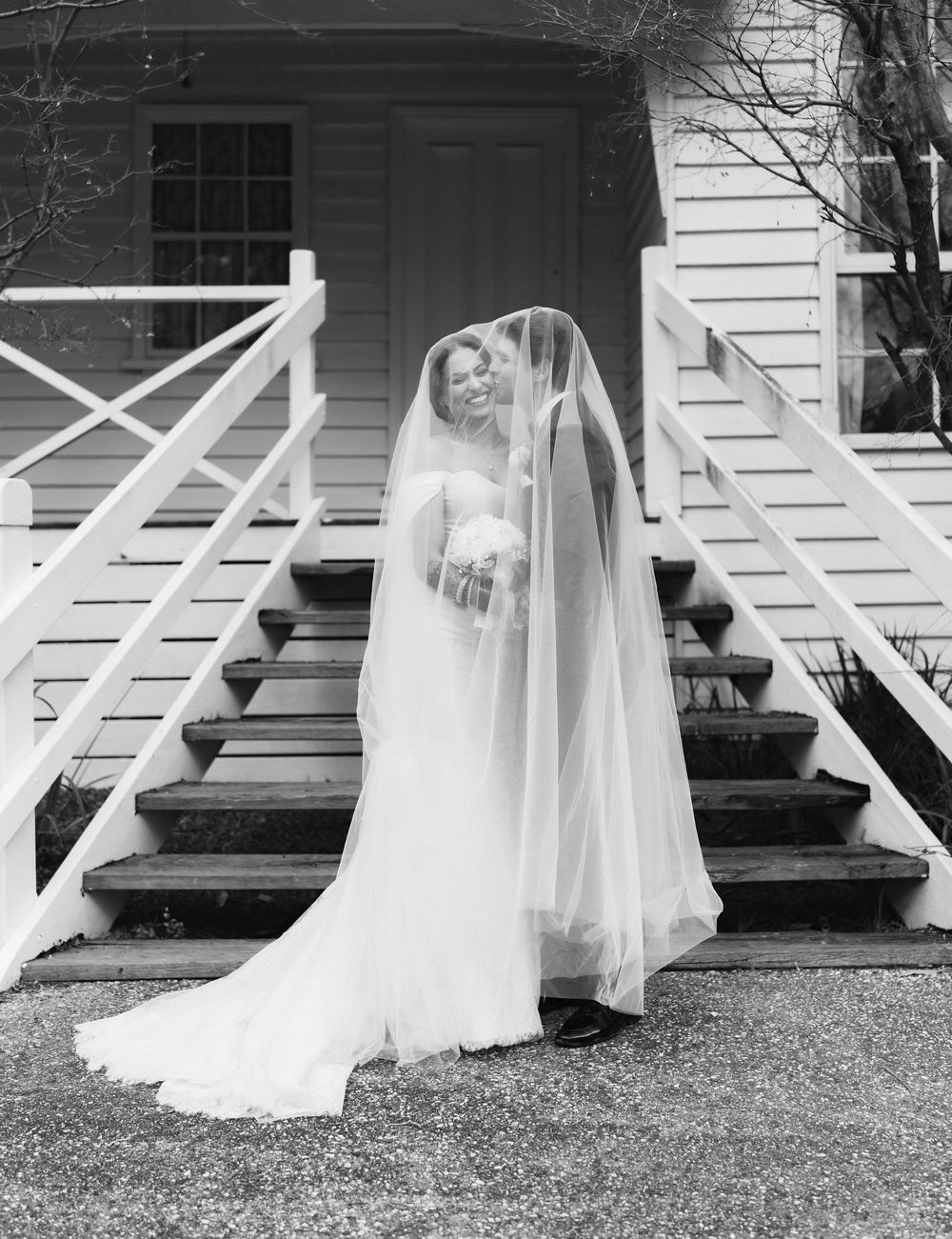 A series of black and white photos showing a bride in a flowing white gown twirling on a porch.