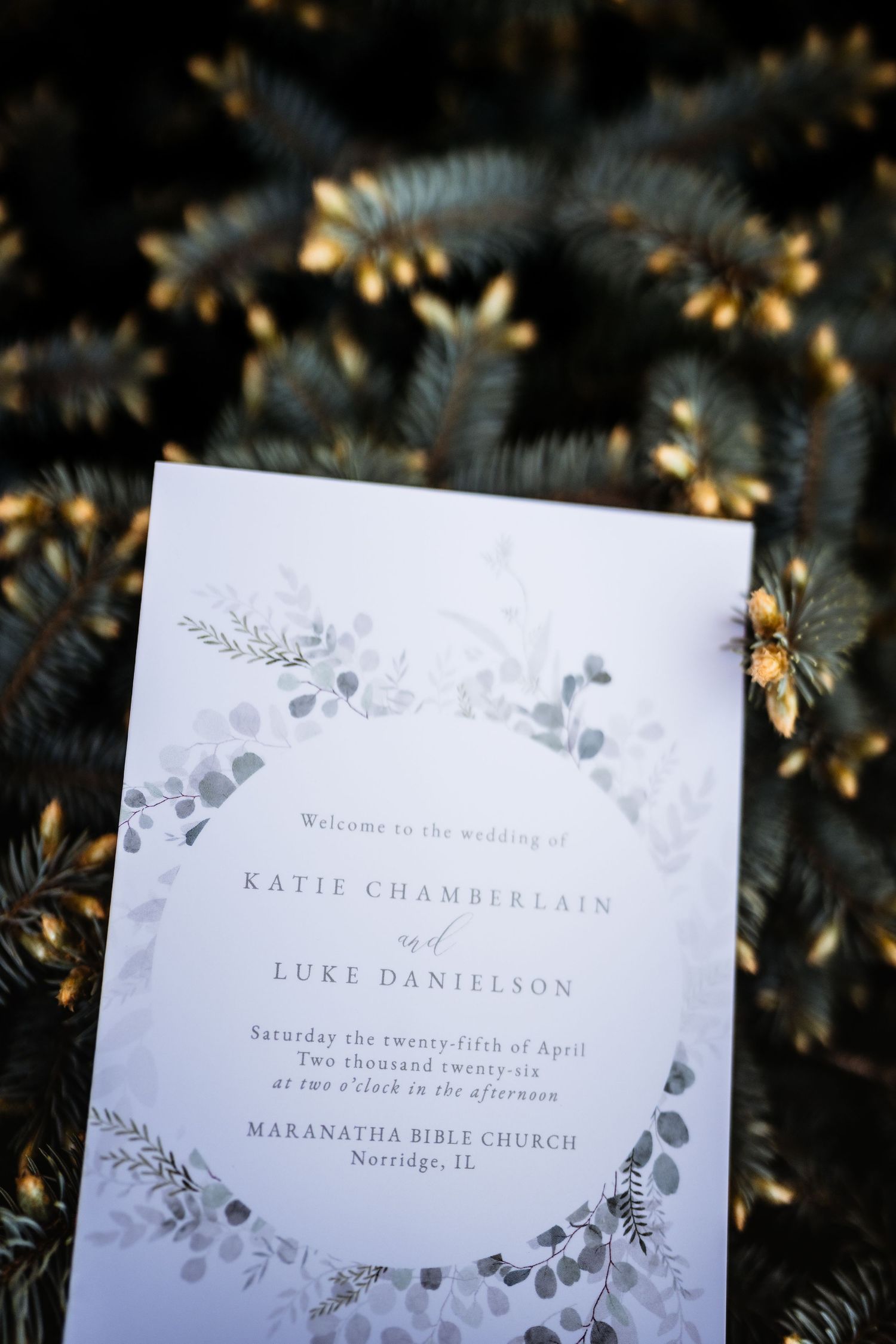 Elegant wedding program for Katie Chamberlain and Luke Danielson at Maranatha Bible Church, Norridge, IL, April 25, 2026.