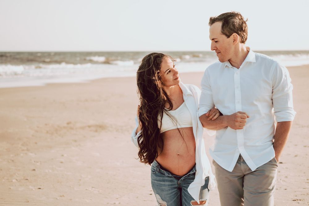 maternity photo session on the beach at Robert Moses field 5 by roots and memories