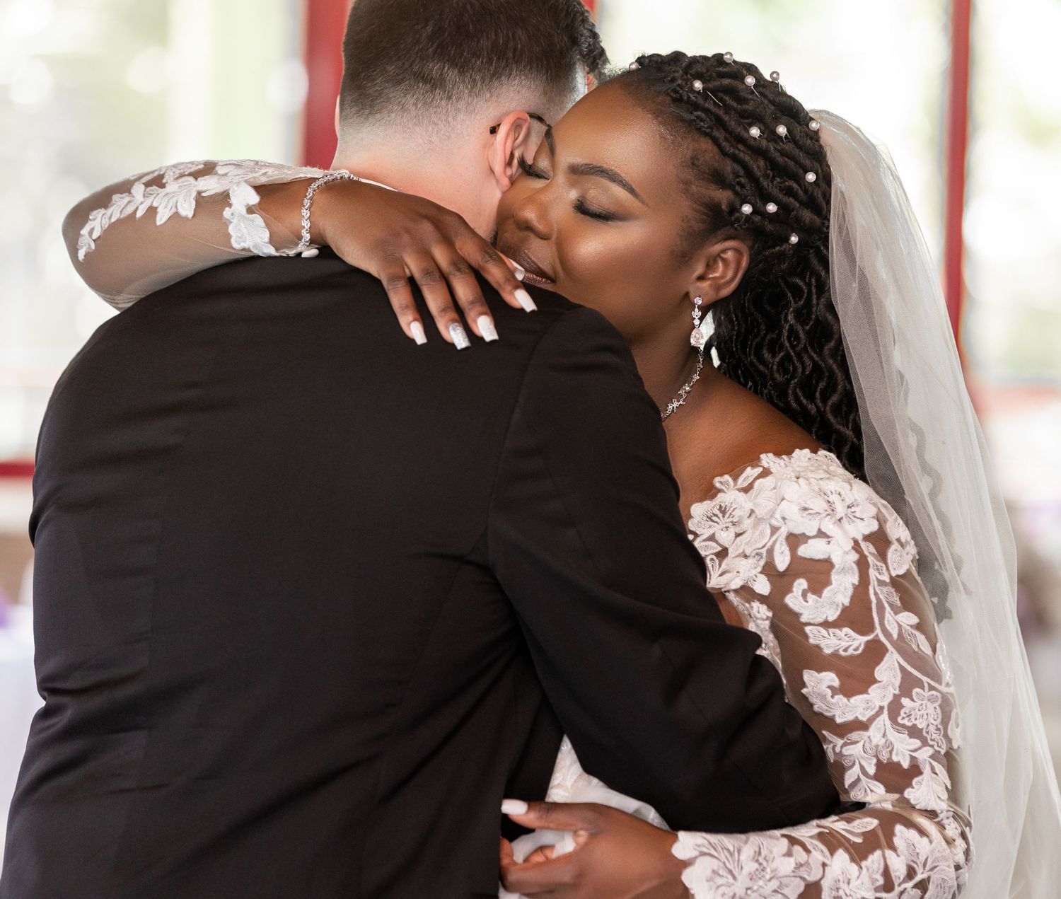 Treasure Coast wedding photographers captured this bride and groom's hug.