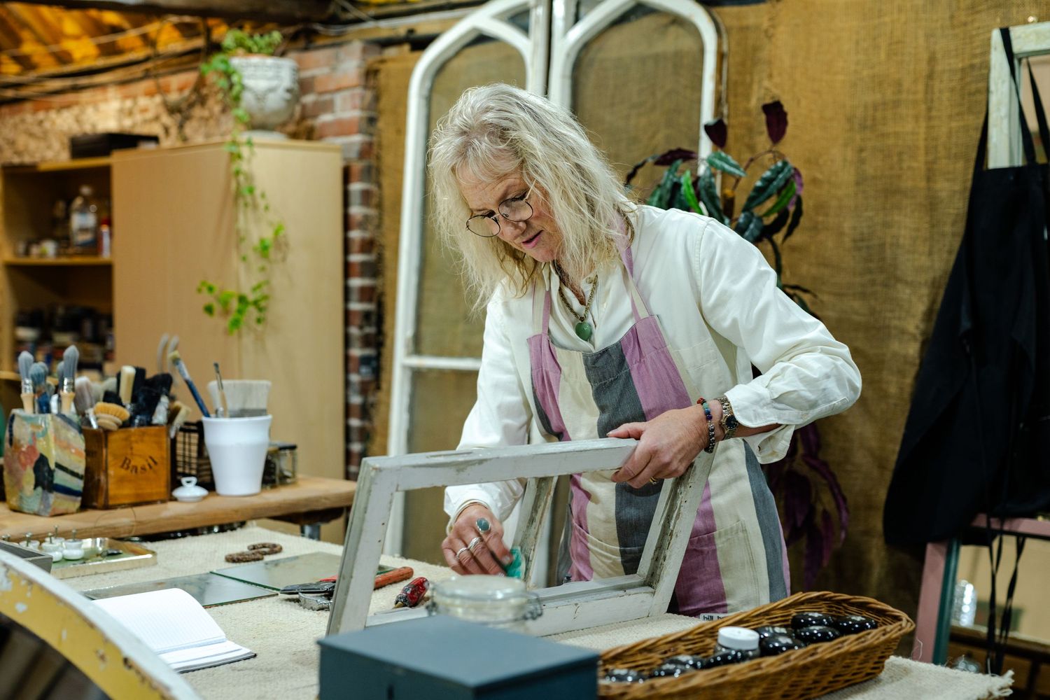 Kent artisan working in workshop during branding photography session