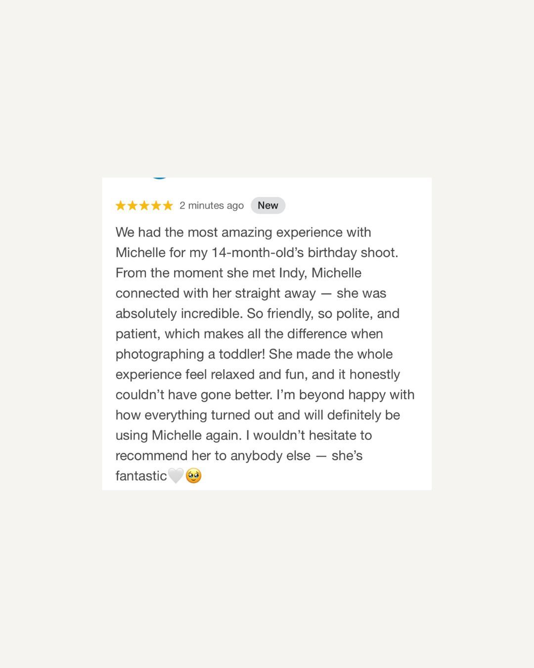 Five-star Google review praising photographer Michelle for a 14-month-old birthday shoot, highlighting her patience and professionalism.