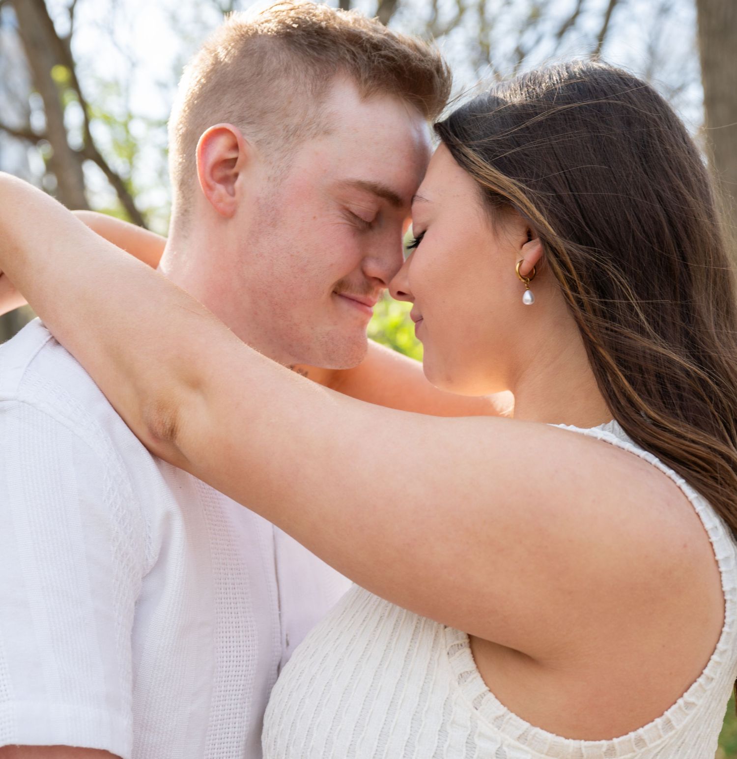 A couple kissing.