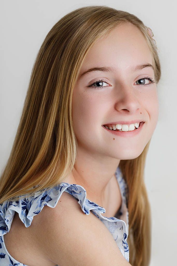 Canyon Lake Photographer - portrait of young girl smiling.