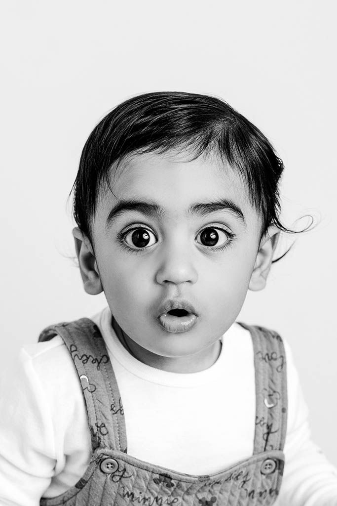 Black and white portrait of a baby boy by Moreno Valley Photographer.