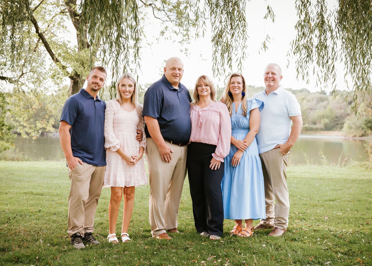 family photographer outdoors natural light Jessica Roth Photography Janesville Wisconsin Professional Photographer  children love affection