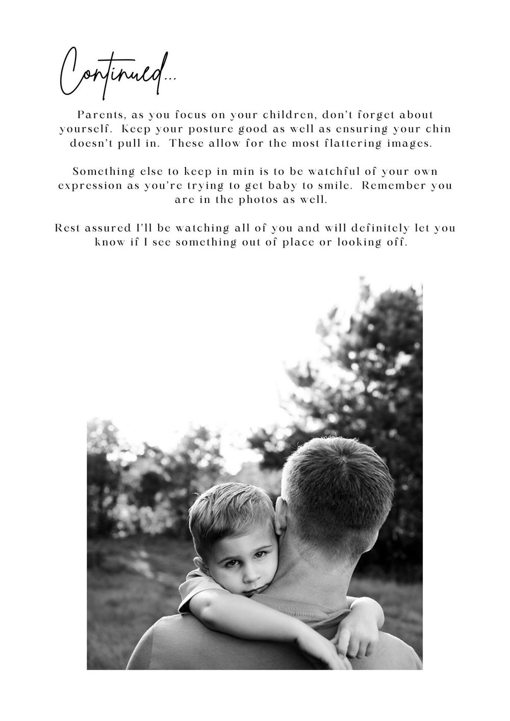 A father tenderly holds his young child in an outdoor setting, capturing a heartfelt family embrace.
