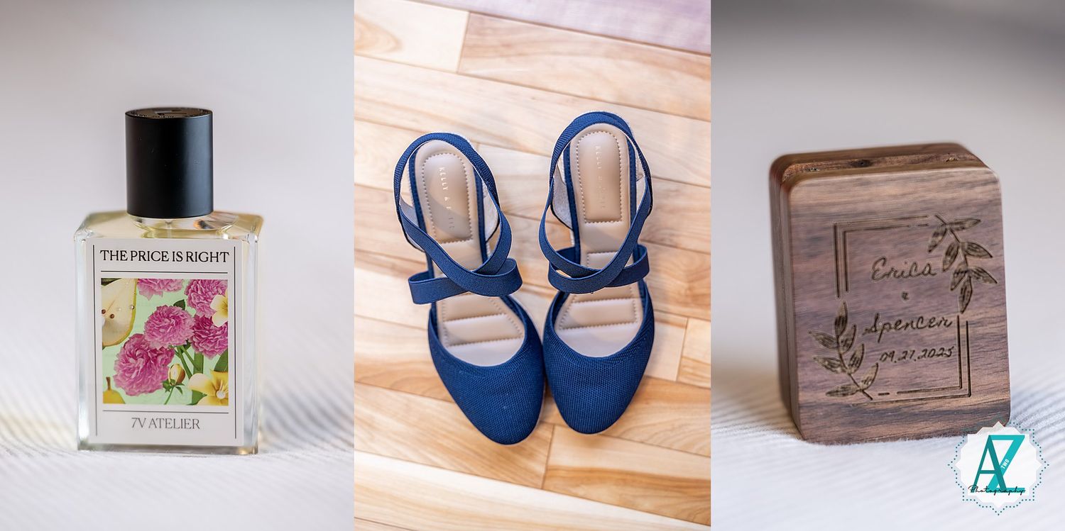 Vintage wooden crates and blue slingback sandals arranged with paper goods and packaging materials in a rustic display.