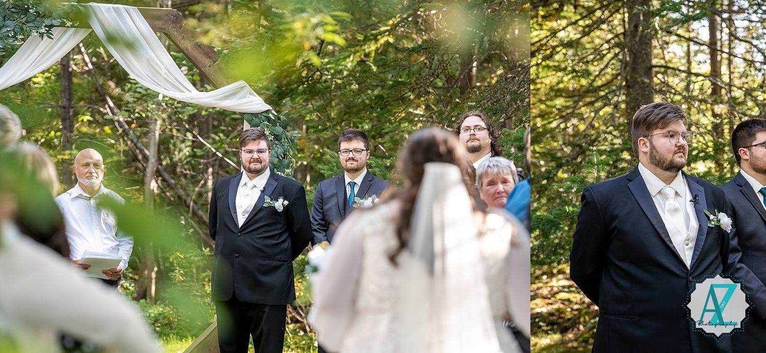 Wedding party members gather outdoors in a lush green garden setting during a summer celebration.