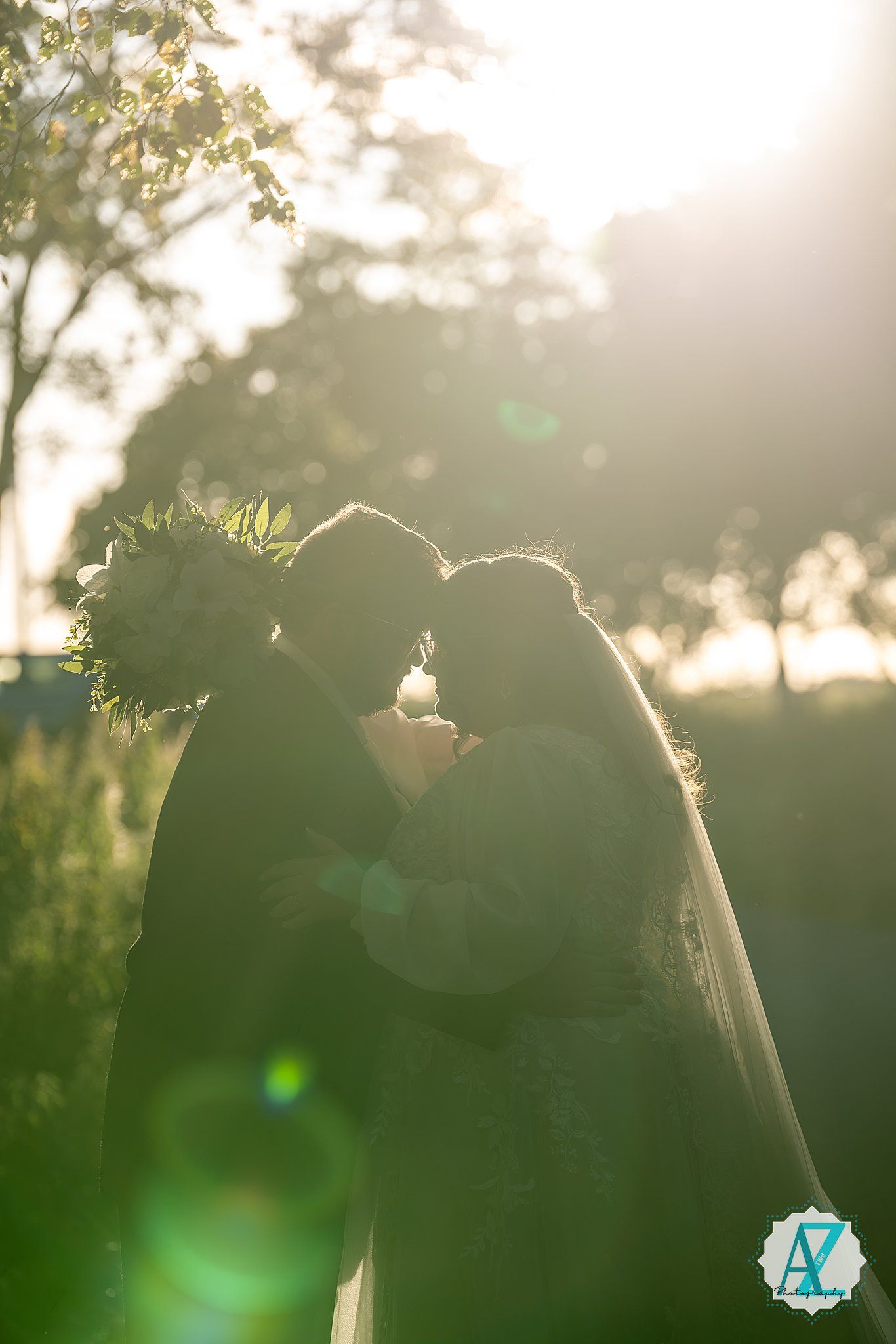 Dreamy backlit silhouettes in a natural outdoor setting at sunset.