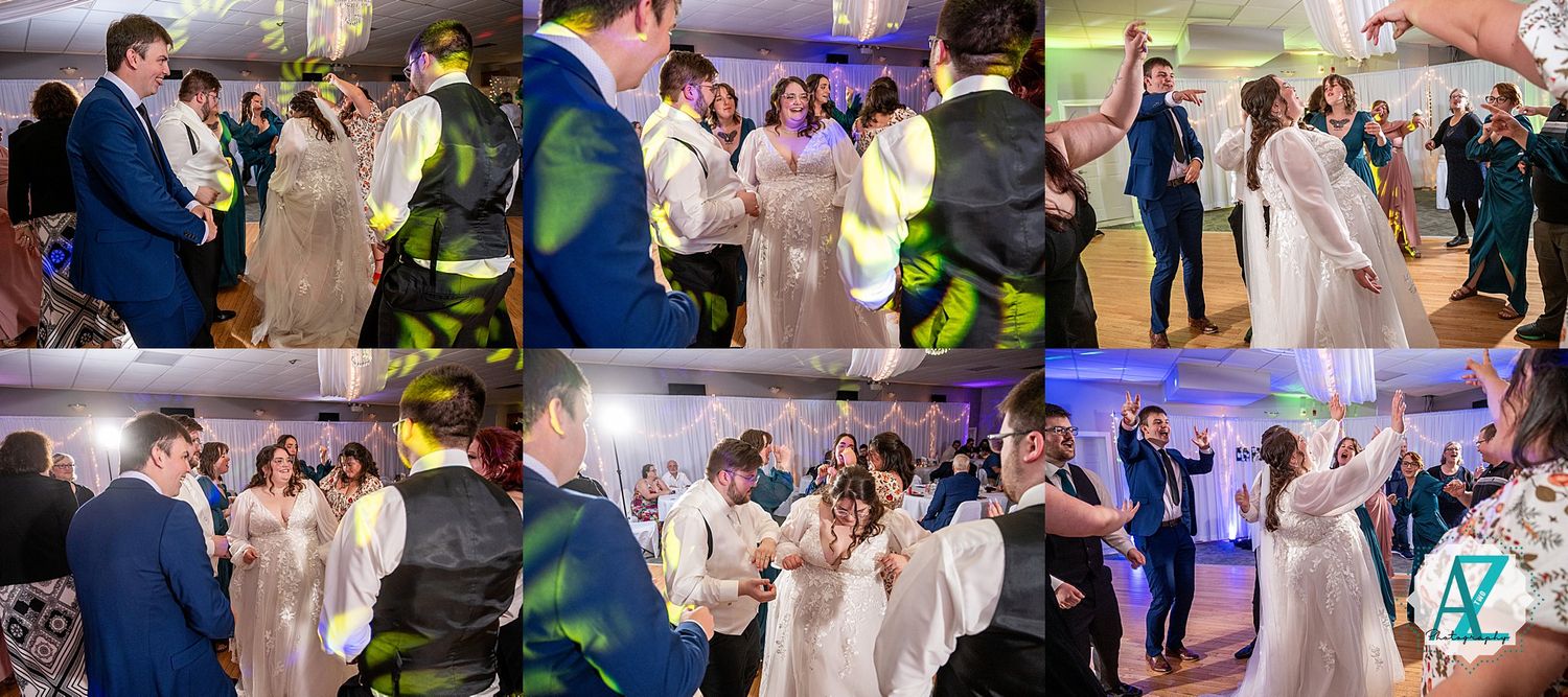 Wedding party and guests dancing together at an indoor reception with festive lighting.