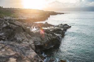Proposal engagement couple sunset photo at Ironwood beach  Maui Hawaii