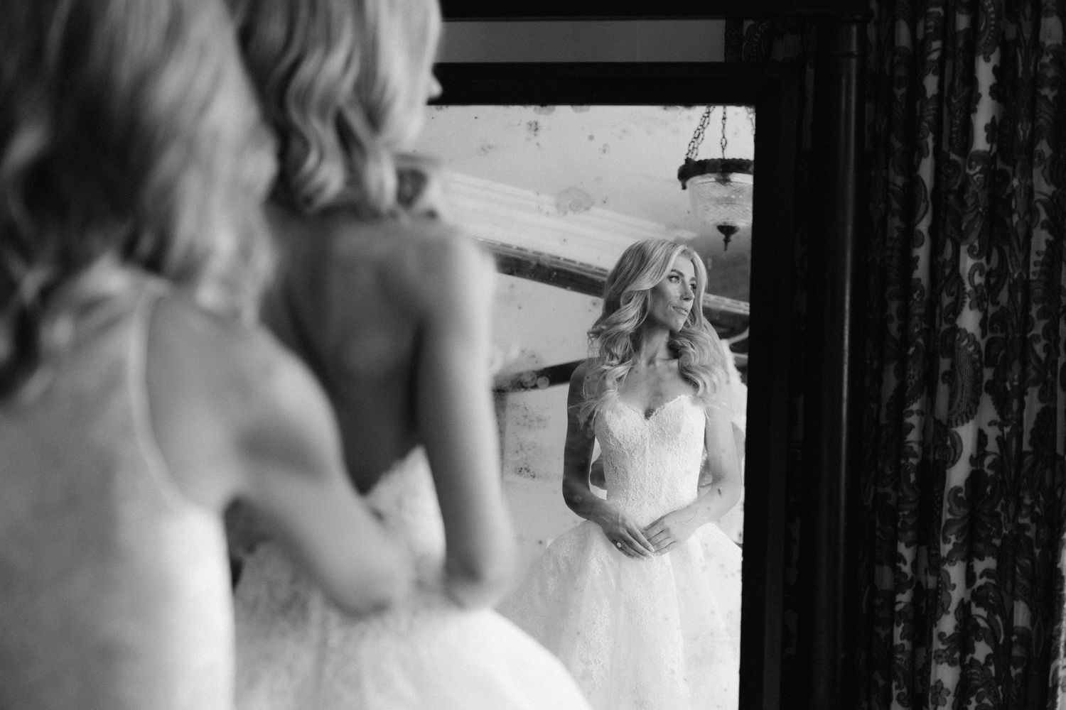 A series of black and white wedding photos showing romantic moments between a couple during their special day.
