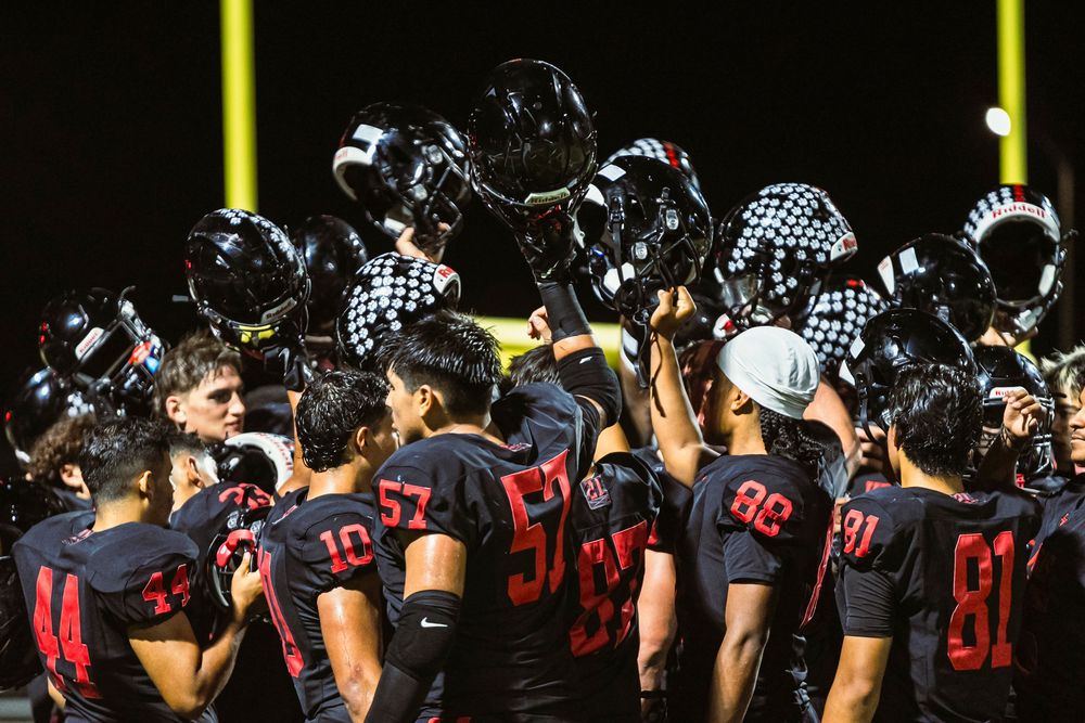 Football players celebrating before a game