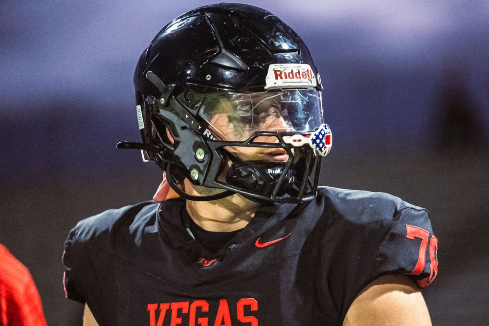 Football player looking off right frame