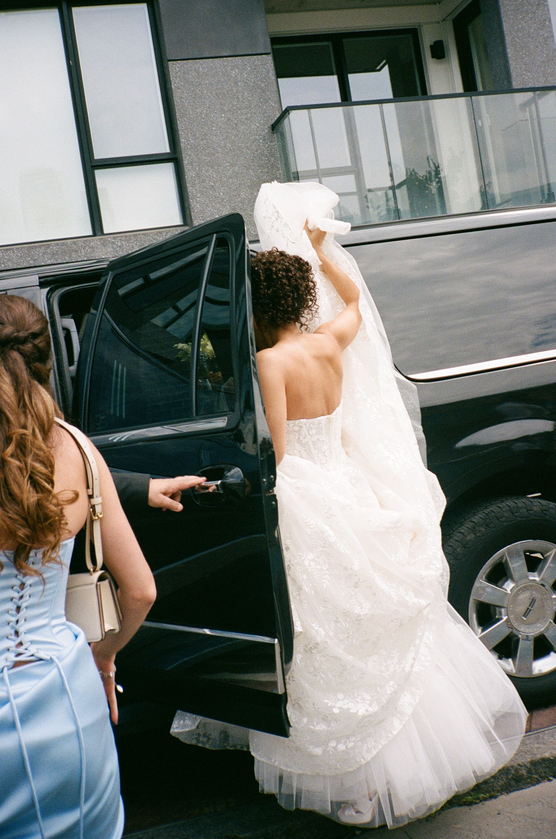 A sequence of photos showing someone in a white wedding dress getting into a black luxury car.