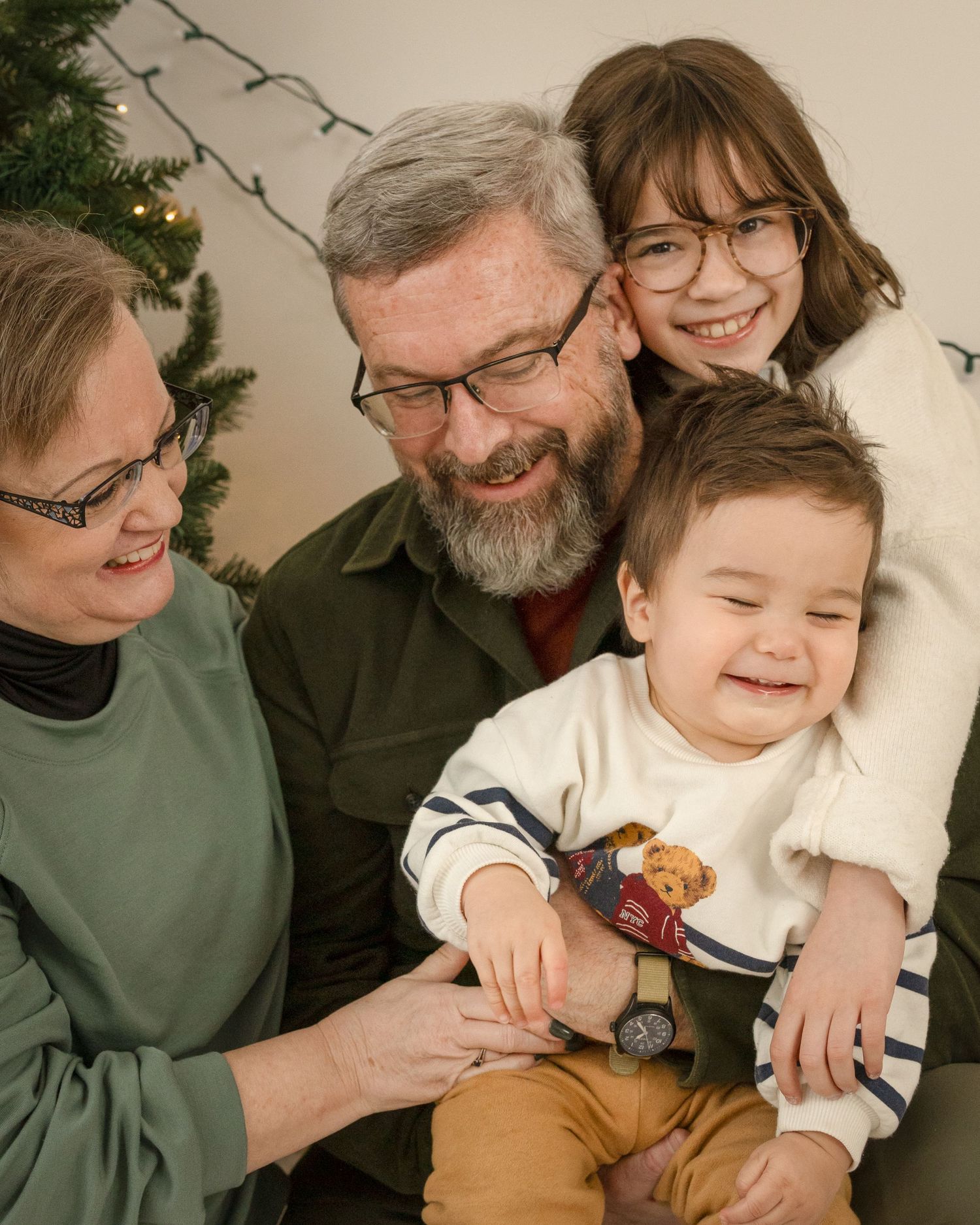 A heartwarming series of candid family moments showing playful interactions and laughter between loved ones.