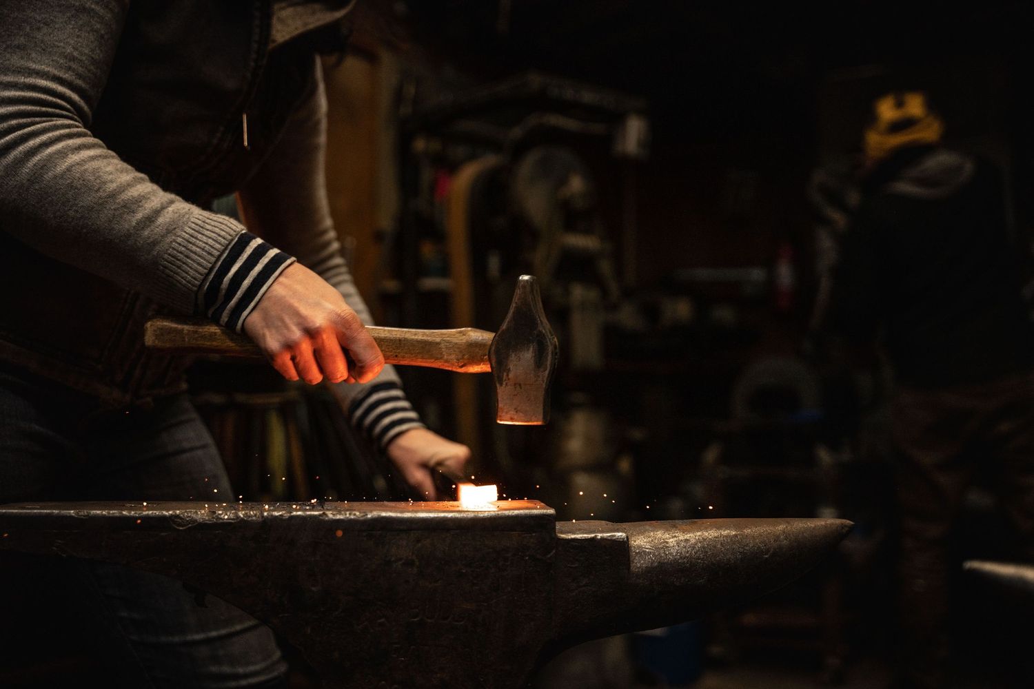 Close-up of metalwork in a traditional artisan shop in Tuscany; branding photography for handcrafted Italian products.