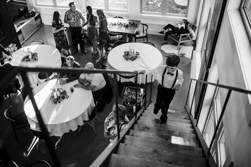 A black and white photo montage shows multiple candid moments at an elegant indoor event or reception.