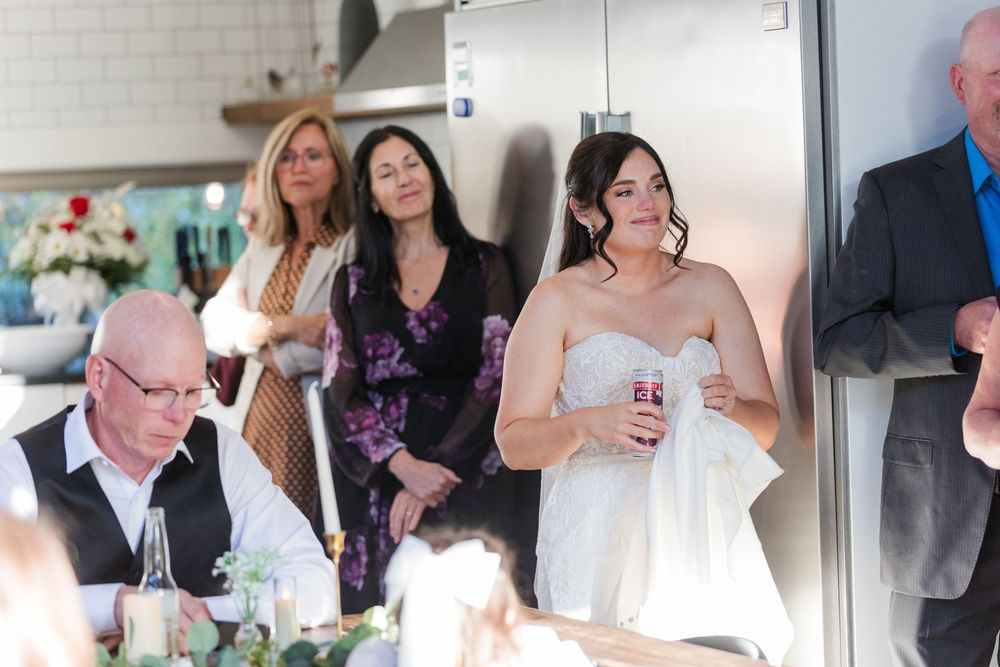 A collage of wedding photos showing guests mingling and celebrating at an indoor reception venue.