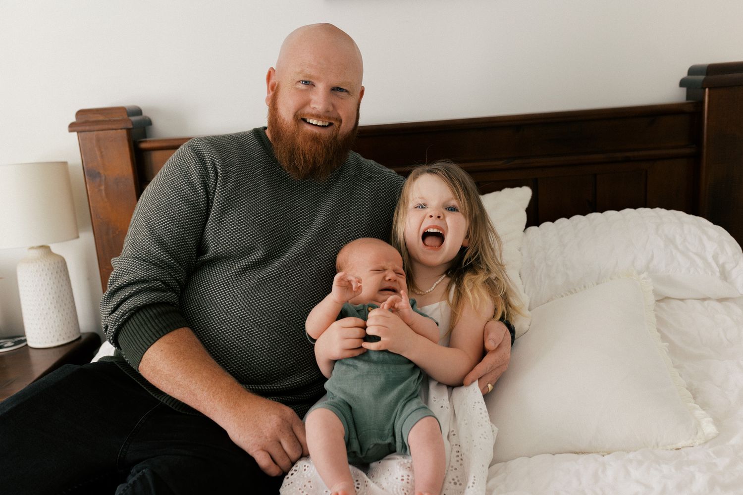 A series of candid family moments showing playful interactions between parent and child on a couch and bed.