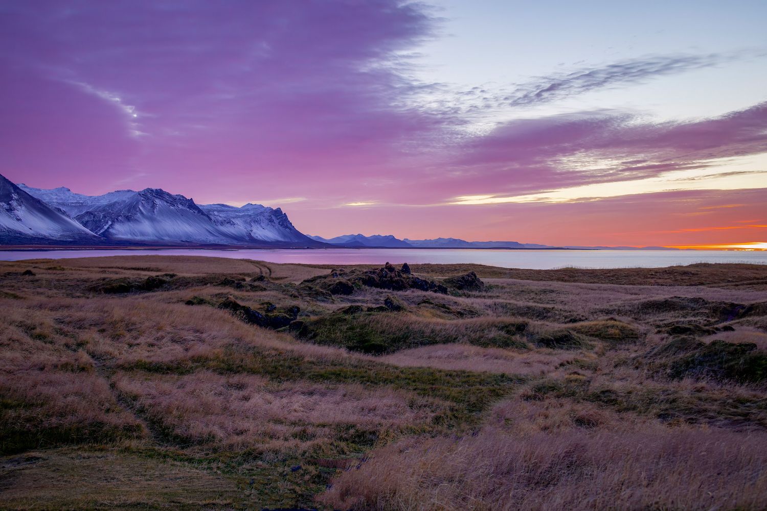 Warm pink sunrise light in Iceland