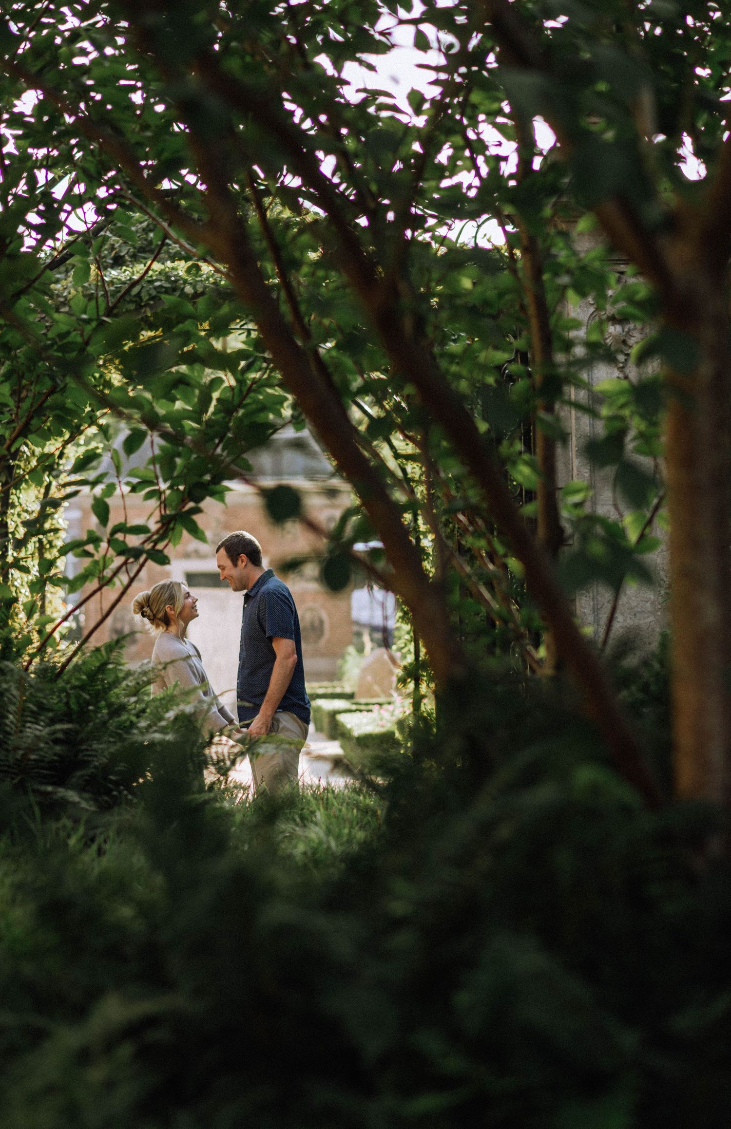 Romantic candid couple photo in Vondelpark, Amsterdam.