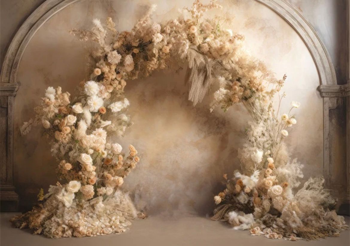 Elegant floral arch installation with neutral dried flowers and foliage in beige tones.