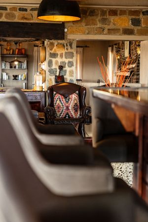 Showcasing the interior of a South African Luxury Safari Lodge Bar Lounge.