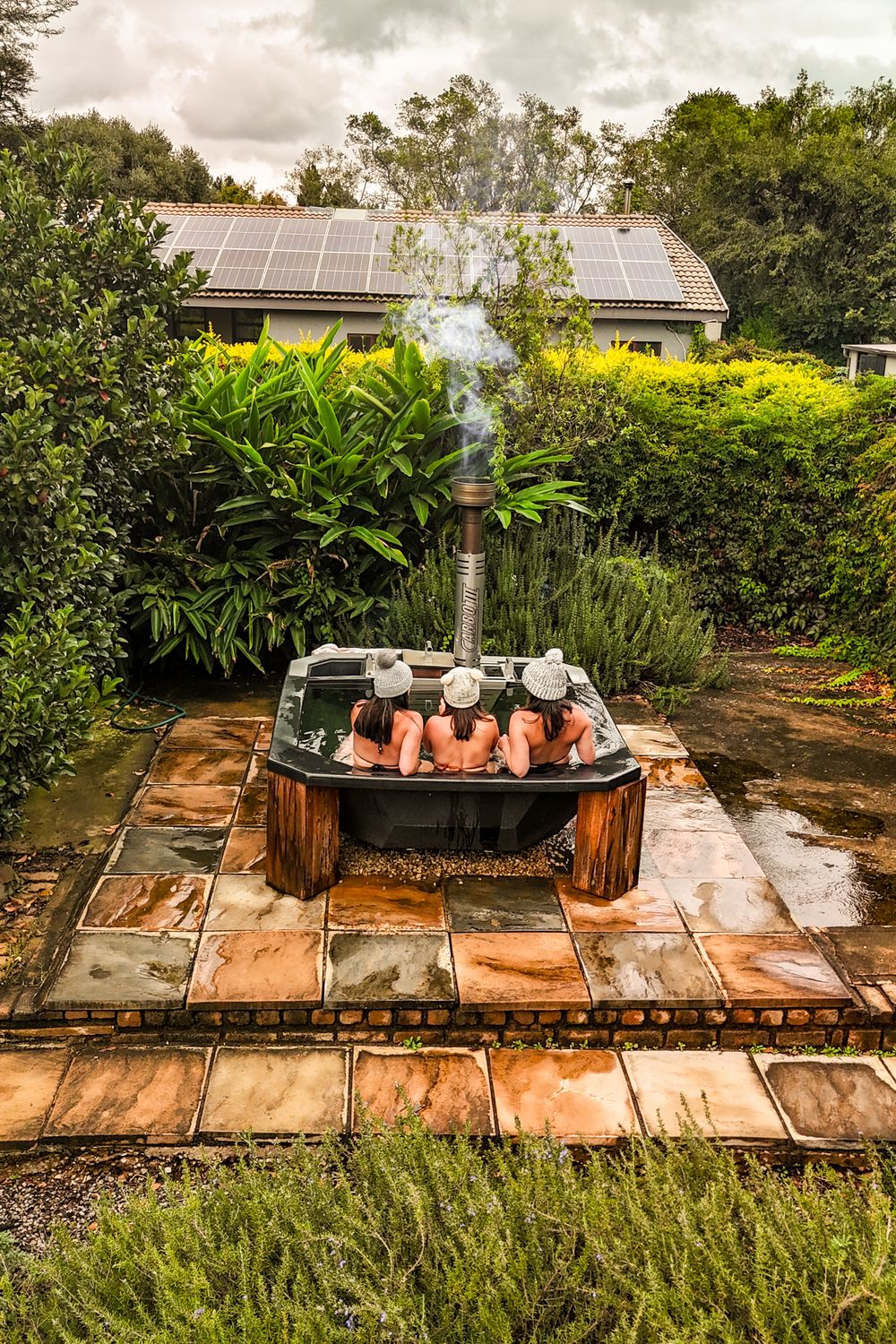 Winter warmer hot tub experience at a Boutique, unique stay in South Africas surrounded by lush greenery and rosemary gardens.