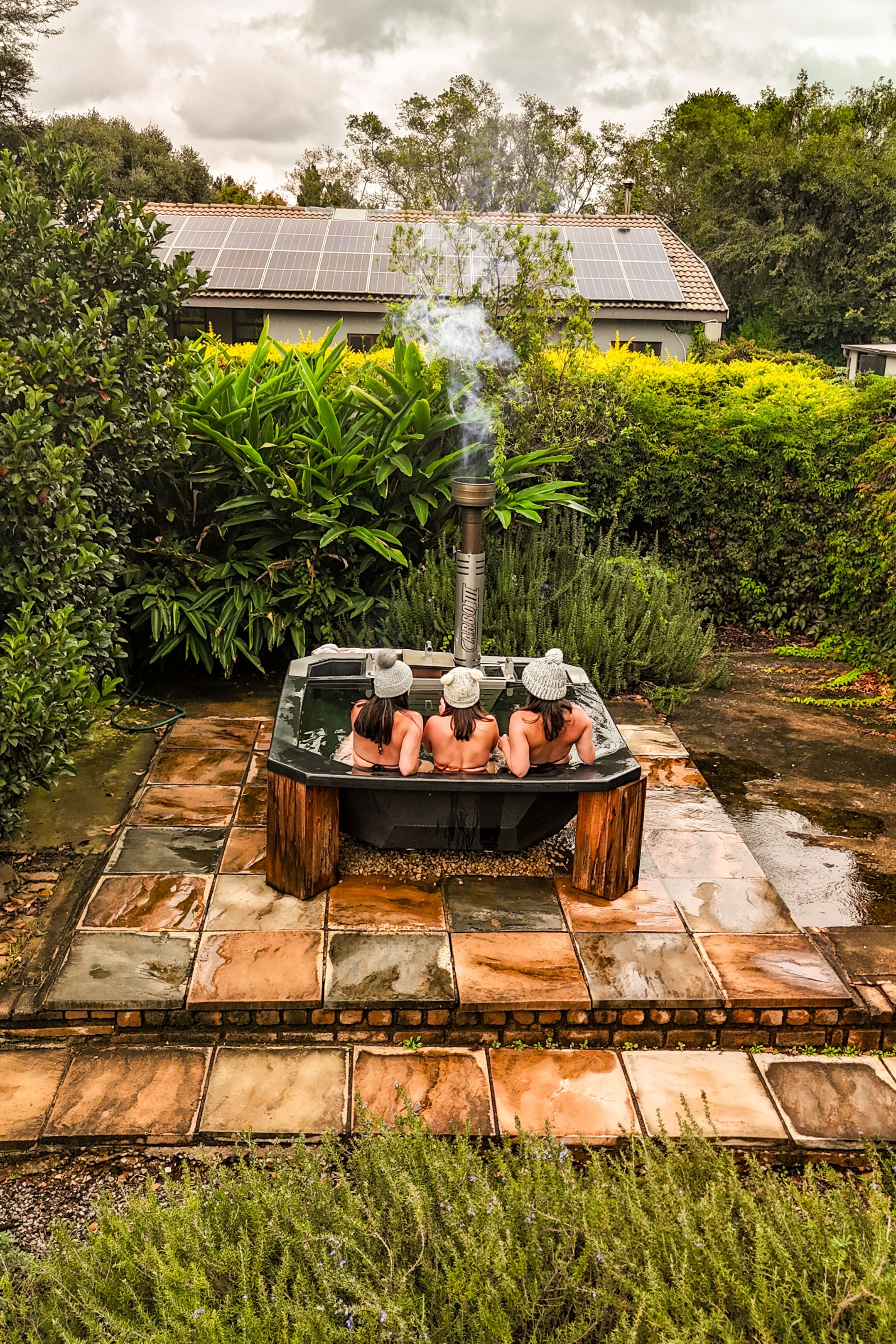 Winter warmer hot tub experience at a Boutique, unique stay in South Africas surrounded by lush greenery and rosemary gardens.