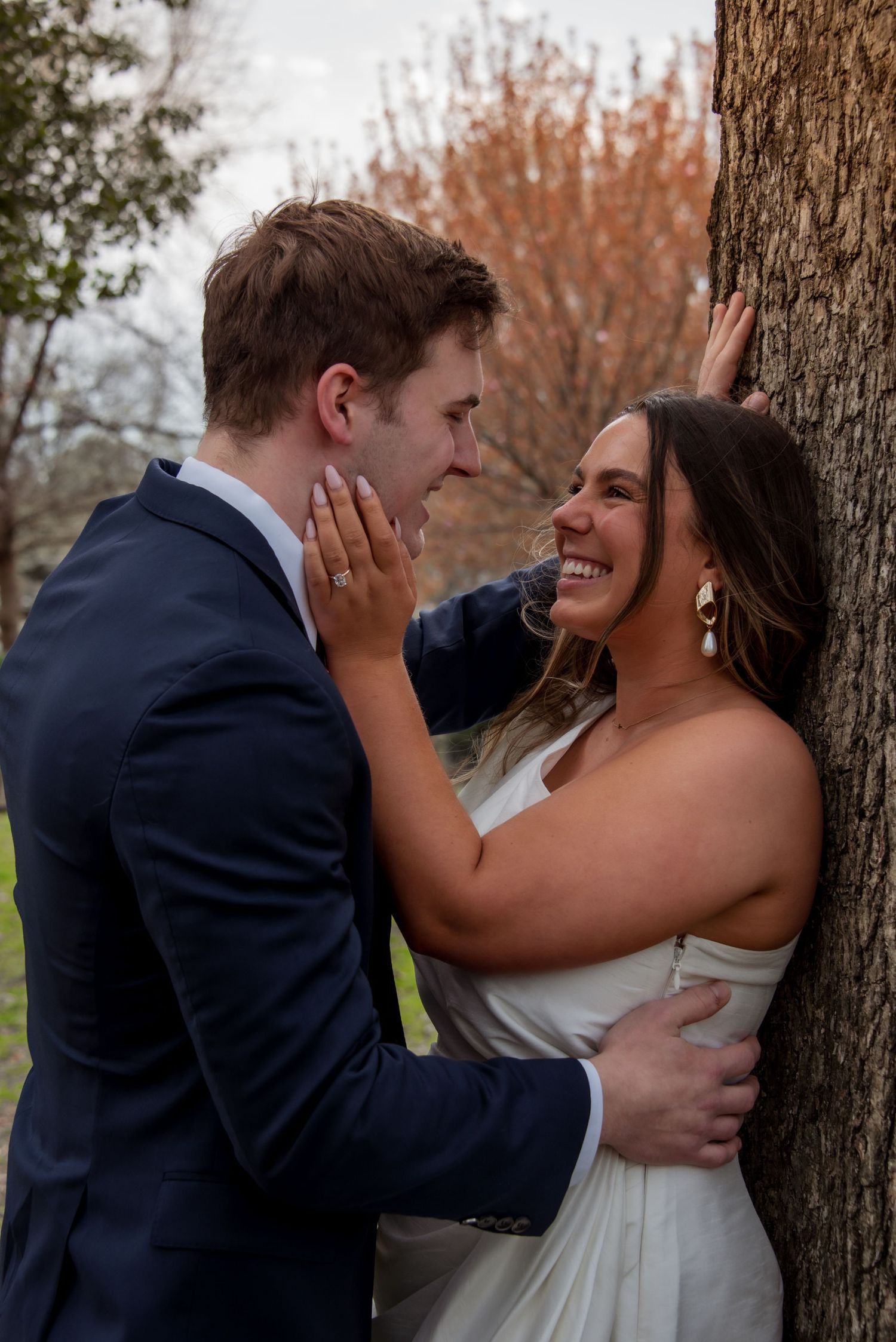 Bride and groom smile at each other