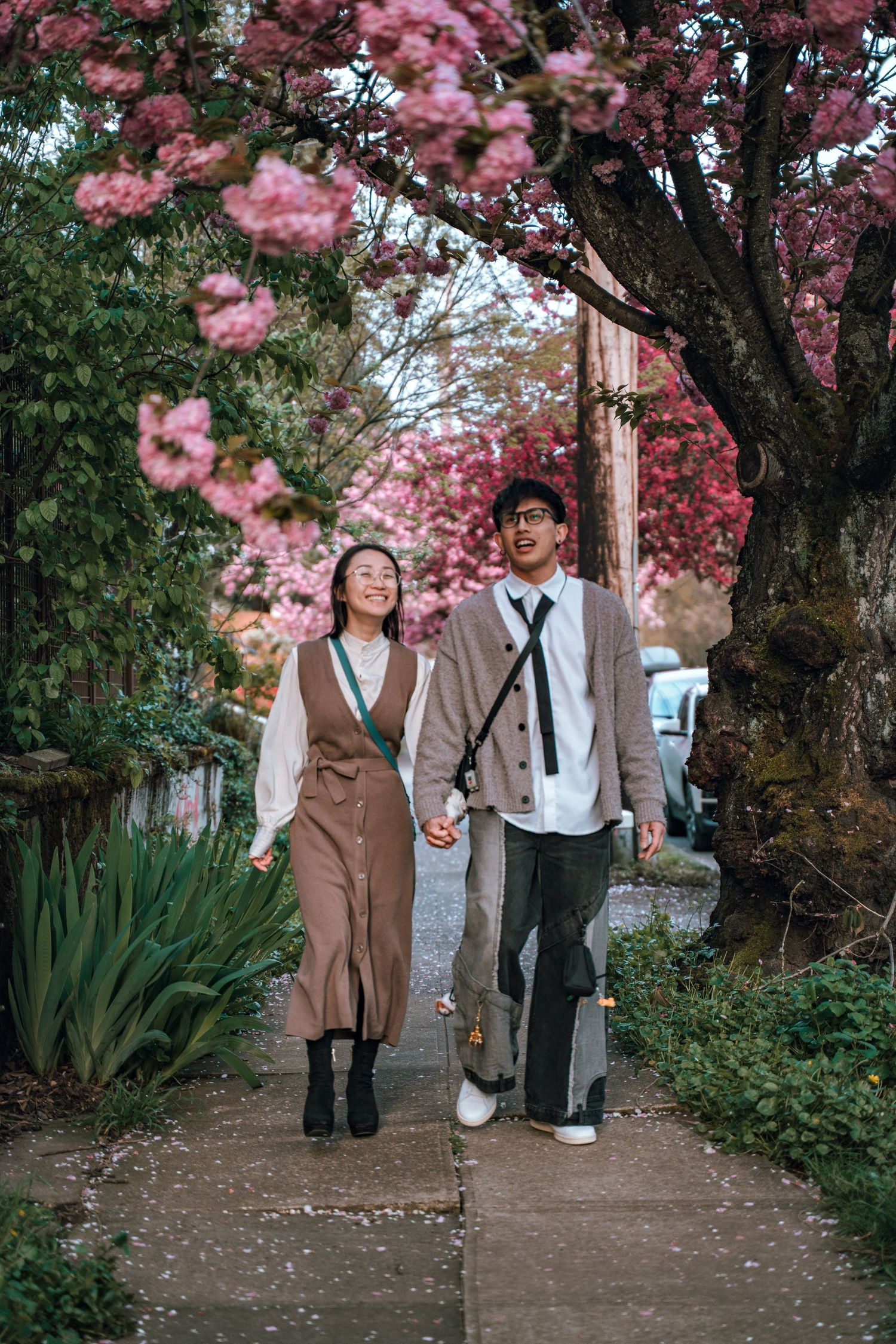 a sweet couples photo shoot walking through beautiful Portland