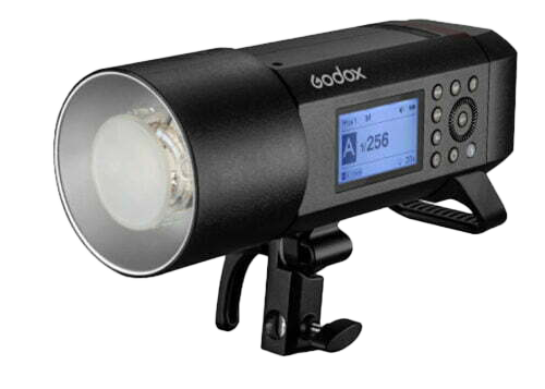 Several black Godox studio strobe lights and photography flashes displayed in a horizontal lineup against white background.