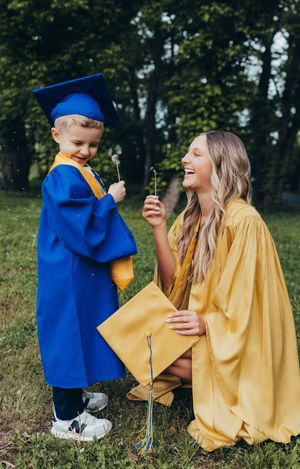 kindergarten cap and gown boy blue cap and gown sister senior girl