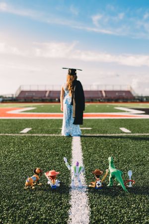 kindergarten cap and gown Toy Story football field