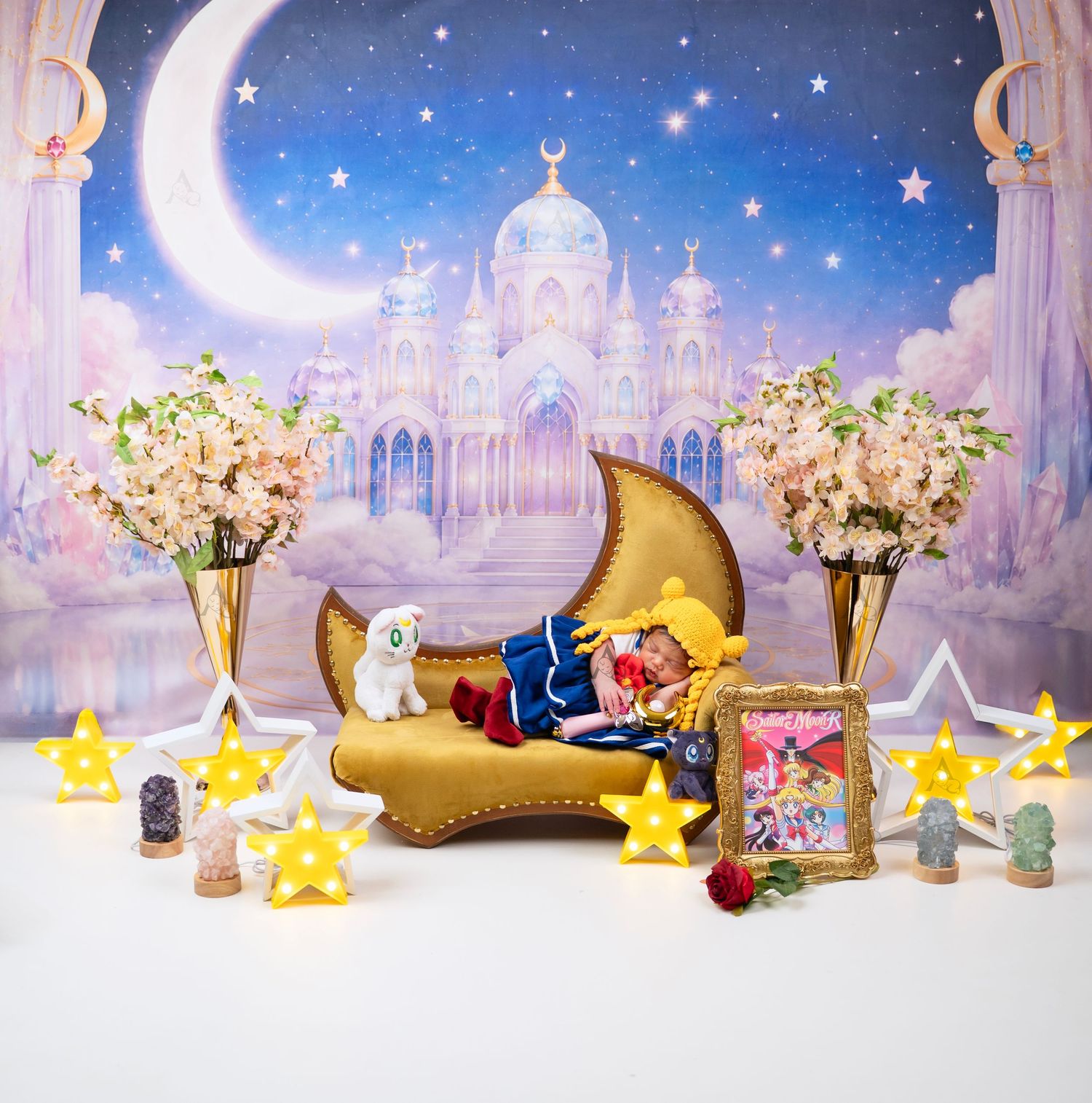 Toy Story themed nursery photo with baby surrounded by colorful toys, plush animals in a playful room. At The Affinity Studio