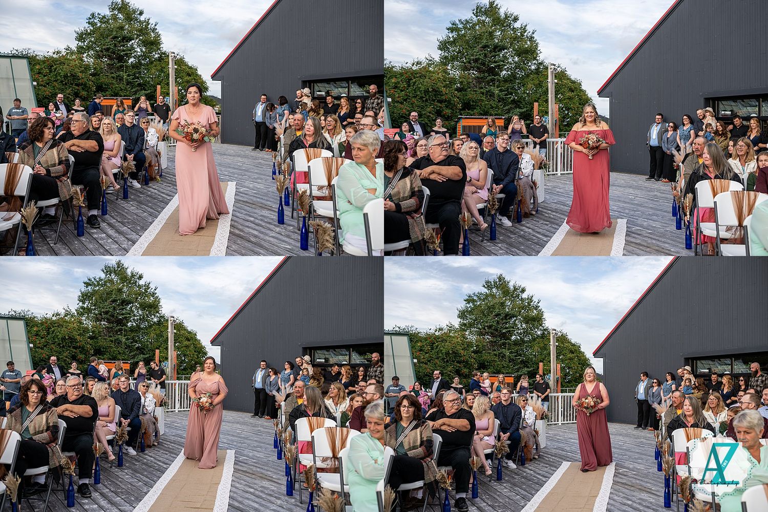 Wedding celebration on an outdoor deck with guests gathered around in summer weather.