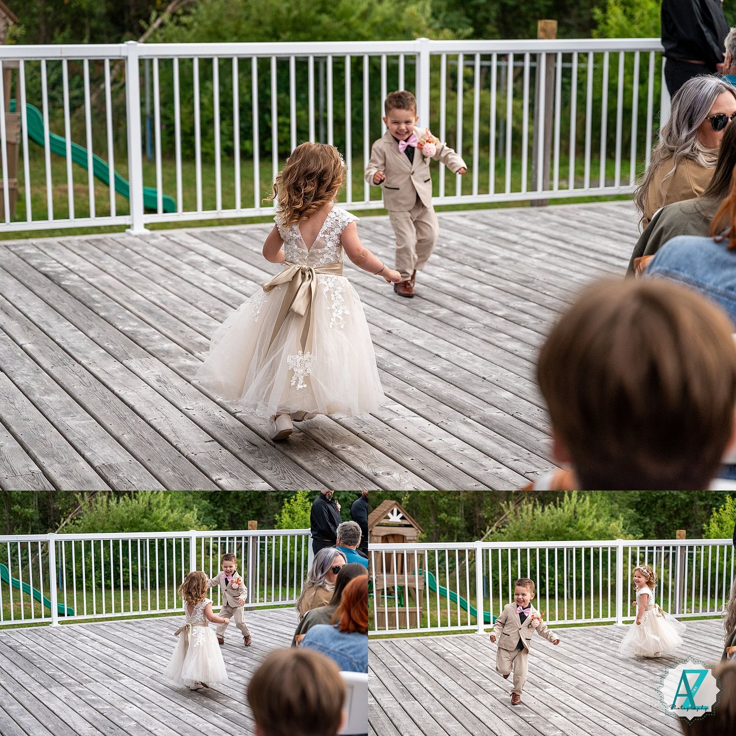 Young children in formal attire dancing and playing on an outdoor deck during wedding reception.